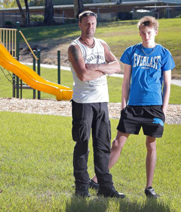 Chris Cocking and his son Taylor, 16, at Ernest Condon Corridor, which is one of many parks in Wodonga without lighting. Picture: KYLIE ESLER