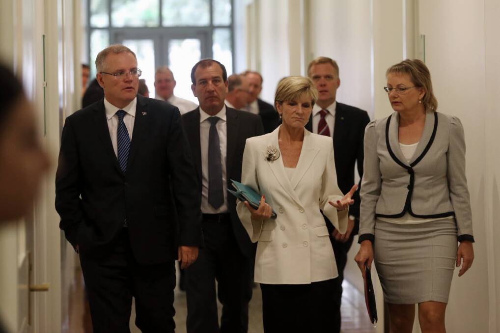 Julie Bishop leaves the Liberal party room with Scott Morrison, Mal Brough and Sussan Ley after Prime Minister Tony Abbott survived a leadership spill at Parliament House. Picture: FAIRFAX