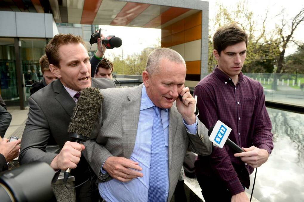 "This is an extremely disappointing result for the players": Stephen Dank leaves the court on Friday. Photo: Justin McManus