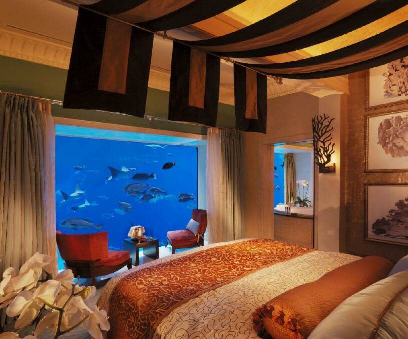 Luxe deluxe: the  two "underwater" suites feature floor-to-ceiling windows directly onto the aquarium.