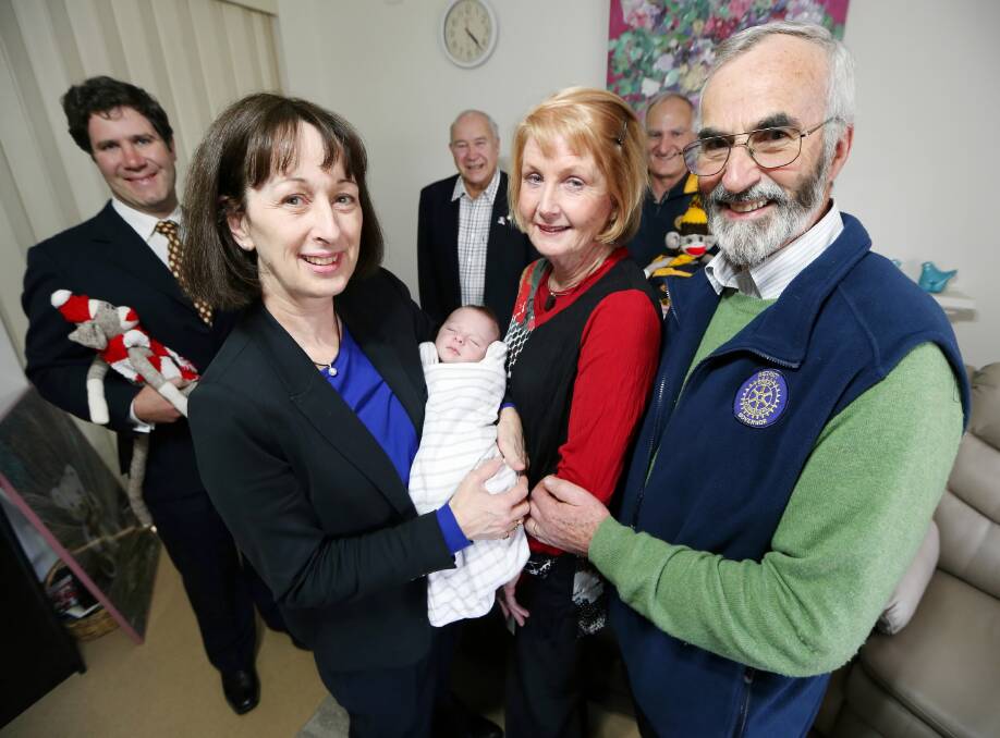 Little Archie Thiele, 3 weeks, will be one bub to benefit from a grant from Albury Hume Rotary. Pictured with him are Albury Hume Rotary president Justin Clancy, AWH operational director of women and children’s services Julie Wright, Albury Hume Rotary past-president Peter Lee, Helen Clancy, Dennis Martin, and district governor Philip Clancy. Picture: JOHN RUSSELL