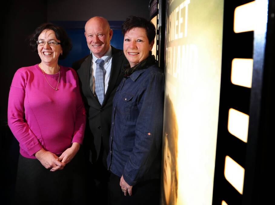 The Border Mail editor Di Thomas joins Regent Cinemas Albury manager Doug Henderson and his wife Robyn at the opening of The Border Mail Film Festival last night. Picture: JOHN RUSSELL
