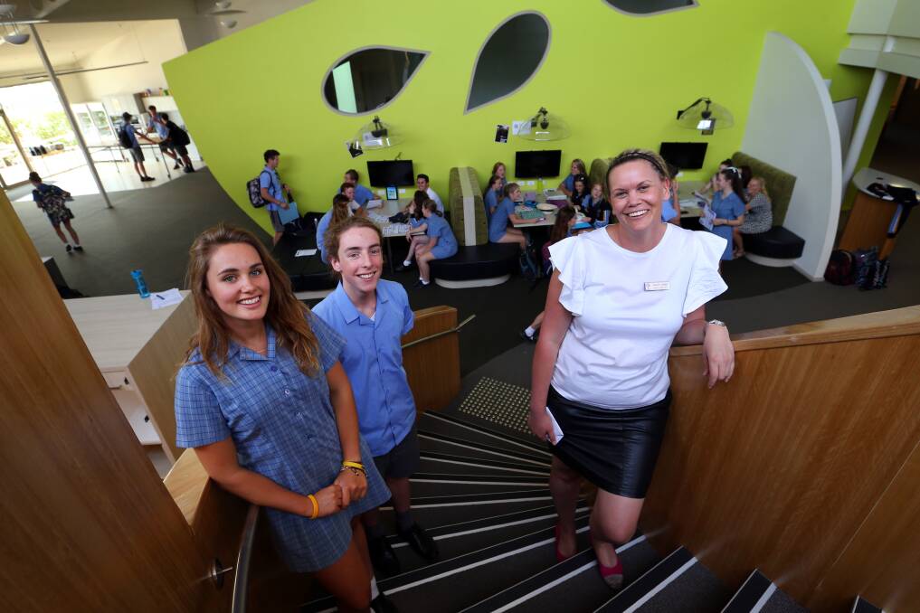 Catholic College Wodonga students Hannah Waite and Harry McKenzie-McHarg, both 17, with learning and teaching deputy principal Sarah Carter. Picture: MATTHEW SMITHWICK