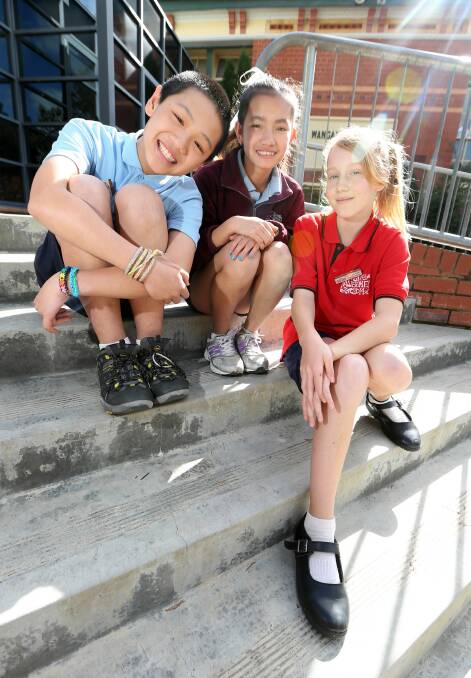 Boren Chen, 12, Thida Rous-Carson, 11, and Akeema Weavers, 12, took part in a student voice forum. Picture: JOHN RUSSELL