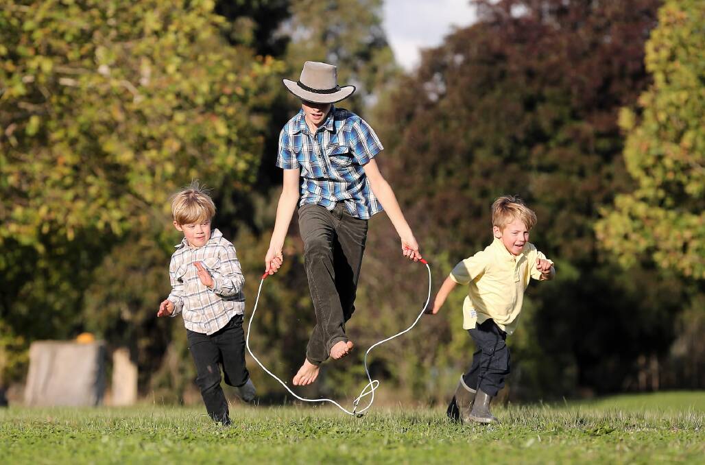 Tahj Wood, 11, helps his little brothers Chase Smith-Wood, 5, and Beau Smith-Wood, 4, prepare for the skipping races at tomorrow’s Wymah Family Fun Day. Picture: JOHN RUSSELL