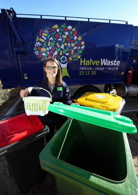 Nina McHardy with the three bins and kitchen caddy aimed at reducing rubbish going into landfill. Picture: MATTHEW SMITHWICK