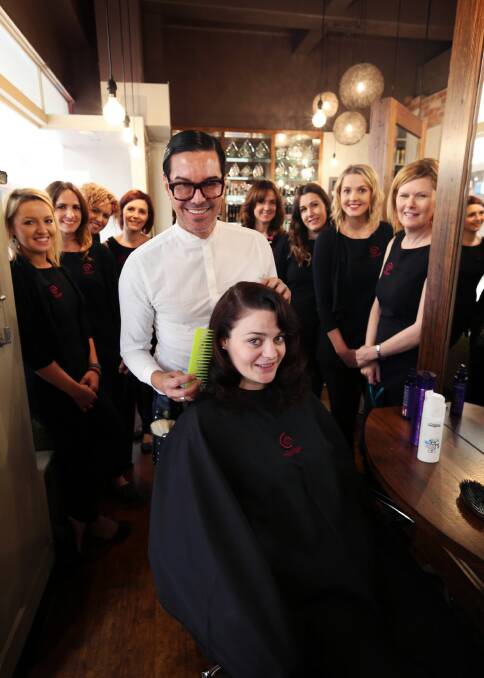 Jess Marshall, of Beechworth, got the special treatment yesterday as she modelled for Sydney hairdresser Brad Ngata at his workshop for Lola Wigg Hair Cafe staff yesterday. Picture: MATTHEW SMITHWICK