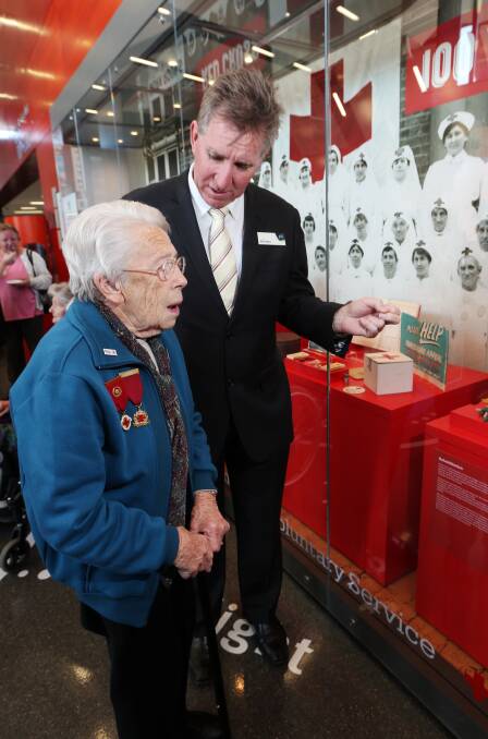 Gloria Feuerherdt with Albury mayor Kevin Mack at the opening of the Red Cross’ centenary exhibition at the Library Museum. Picture: JOHN RUSSELL