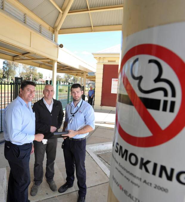 Shannon Moscardo (tobacco enforcement officer), Ian Hardinge (tobacco compliance officer) and Chris Woutersz (senior tobacco enforcement officer) at Wagga railway station. Picture: DAILY ADVERTISER