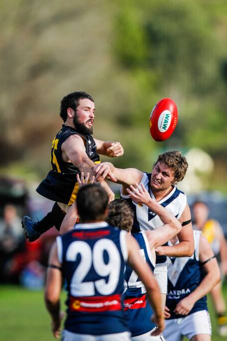 Nathan McKendrick and Mitta’s David Paton contest for the ball. Pictures: DYLAN ROBINSON