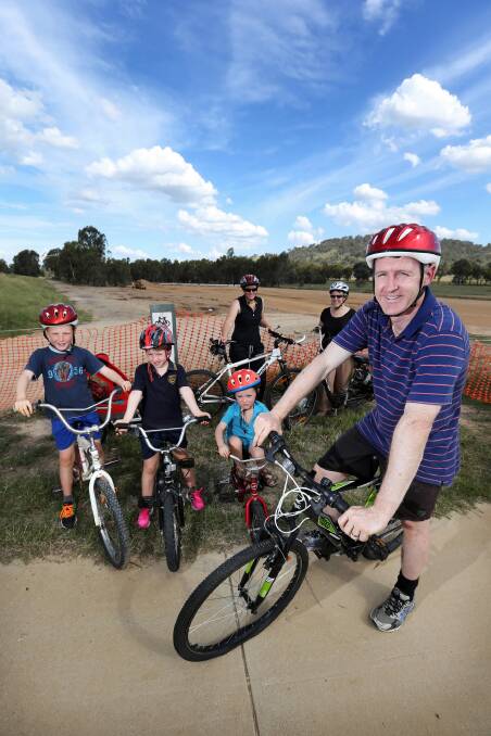 Dave Bonner would like to see a rail trail through Wodonga to keep him, his children Jack, Ruby and Harry, Jane Dalziell and his wife Kylie safe when they go for a ride. Picture: MATTHEW SMITHWICK