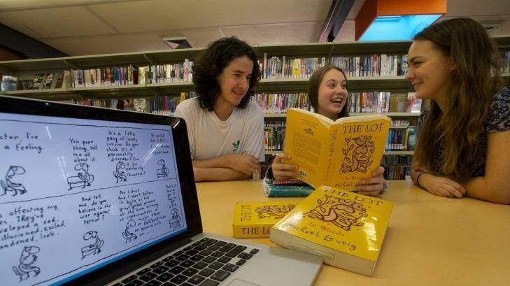 Under pressure: Strathmore Secondary College pupils, from left,  Liam Anderson, Samara Watt and Jessica Ball study Leunig's The Lot. 