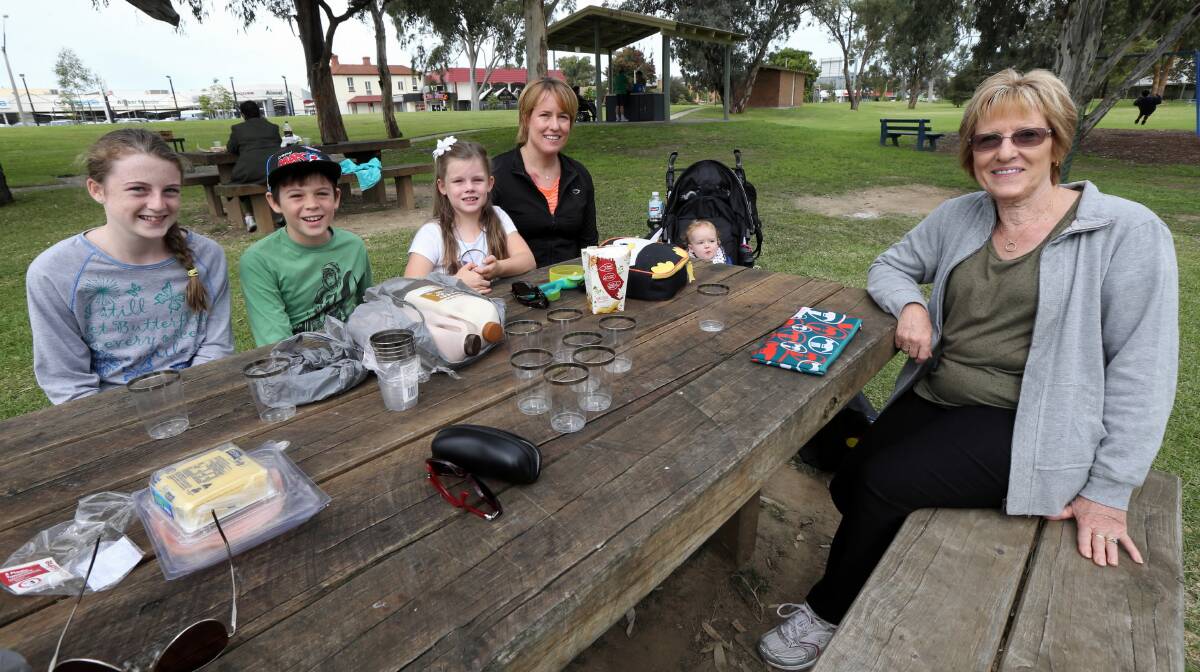 Keeley, 12, Lachlan, 10, and Ainsley O’Reilly, 6, with Belinda Rimell and son Thomas, 15 months, and Kaylene Campbell at Hovell Tree Park.