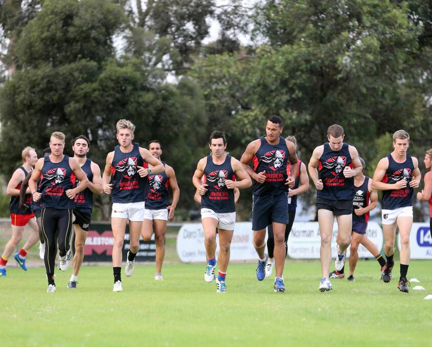 Matt McDonald, centre, steps it out at Wodonga Raiders’ training session. He is looking forward to facing North Albury today. Picture: JOHN RUSSELL