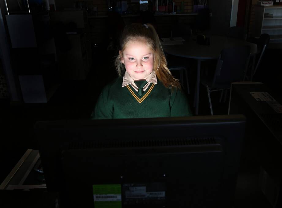 Holy Spirit School student Ashley Boswell, 10, trials the NAPLAN test online in preparation for the real thing. Picture: PETER MERKESTEYN