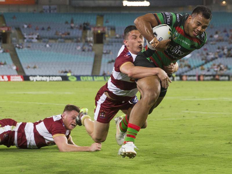 Richard Kennar scores in South Sydney's 18-8 rugby league friendly win over Wigan at ANZ Stadium.