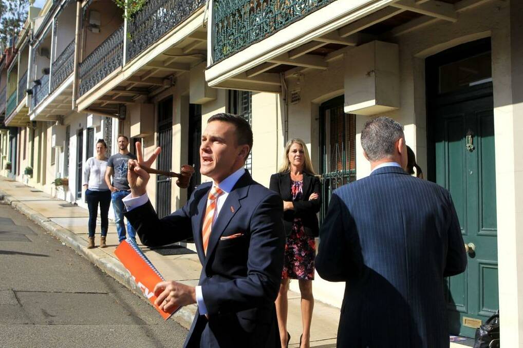 Auctioneer Damien Cooley at auction of 6 Gordon Street, Randwick, owned by former Federal Labor Minister and Midnight Oil vocalist Peter Garrett. Photo: James Alcock