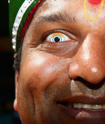Only eyes for India: An Indian fan shows his colours at the SCG on Thursday. Photo: Cameron Spencer