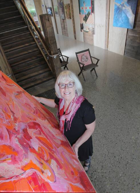 Lesley Labram with paintings of nudes originally submitted for Benalla Nudes. Picture: DAVID THORPE