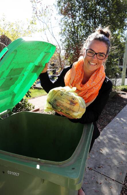 Transpacific Cleanaway’s Nina McHardy is happy with the bin system for organics. Picture: PETER MERKESTEYN