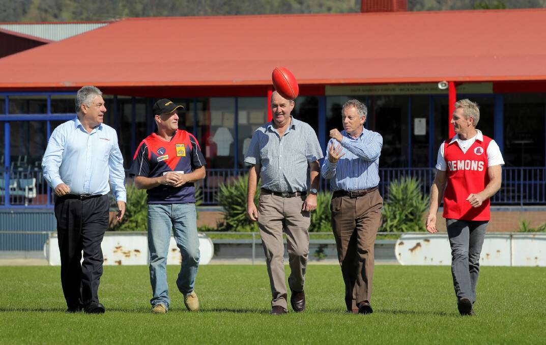 Good times ... Jake Kowski, Paul Twycross, Ashley Bates, Bill Perry and Ross Hedley reminisce about 30 years of football at Birallee Park. Picture: DAVID THORPE