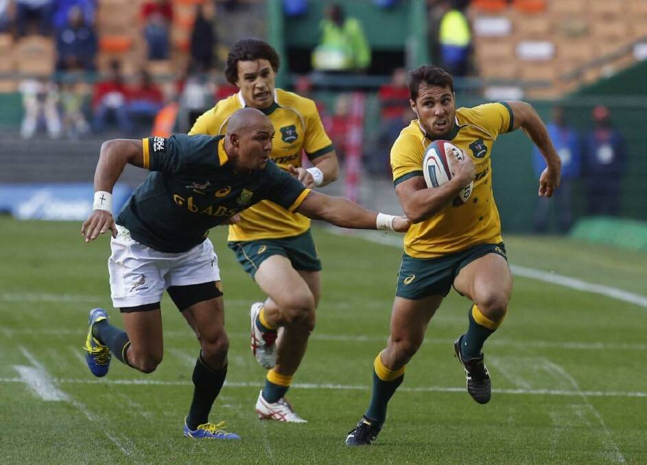No regrets: Nick Phipps tries to evade Cornal Hendricks in Cape Town on Saturday. Photo: AP Photo