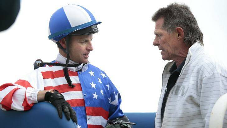 Trainer Garry Clarke speaks to Oh So Adorable's jockey Richard Bensley after a win at Queanbeyan. Photo: Jeffrey Chan