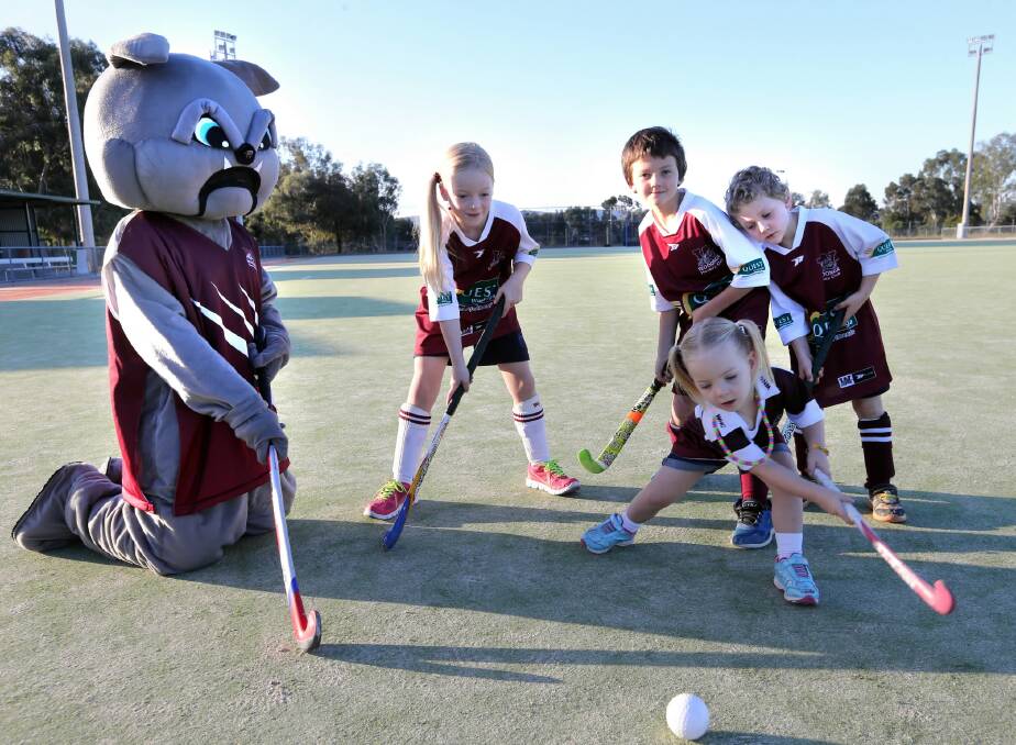 Mascot Hook In2 Hockey along with youngsters Alexis Delany, 2, and Faith Delaney, 7, and Justin Hood, 9, and Oliver Hood, 5, will be taking part in the celebration of everything about hockey in Wodonga this weekend. Picture: PETER MERKESTEYN