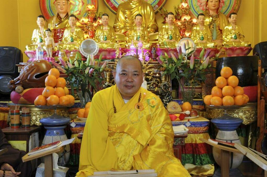 Keeping the Faith: Thich Phuoc Sanh, pictured at a Buddhist temple in Cabramatta, is one of 27 people who discuss their religious beliefs in <i>One Day for Peace</i>.
