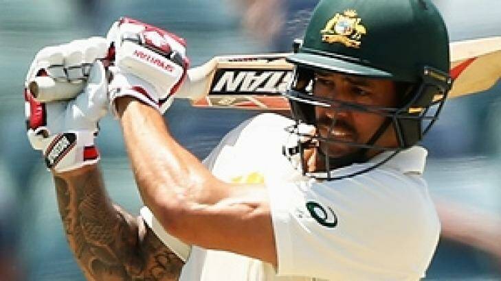 Mitchell Johnson on his way to 29 in his final batting innings, at the WACA.