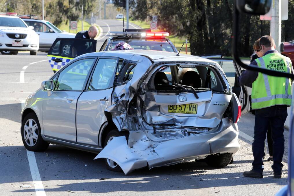 A driver who rammed this car in Wodonga may have had a microsleep moments before the crash. BELOW: Police say a man was lucky to have received only minor injuries after rolling this car several times at Sandy Creek on Thursday night. Pictures: PETER MERKESTEYN and JOHN RUSSELL