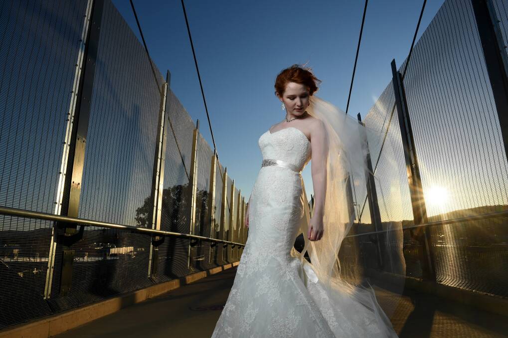 Lacey Smith wears Allure Bridal from Ferrari Formalwear and Bridal ahead of the Albury-Wodonga  Border Mail Bridal Fair tomorrow. Picture: MARK JESSER