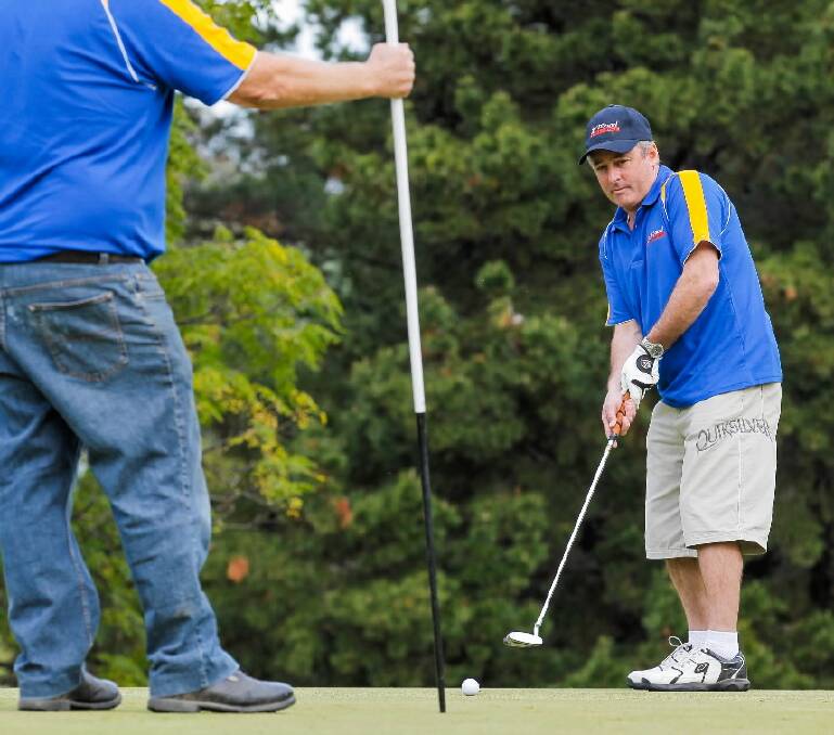 Greg Wood, of Wood Real Estate, putting during yesterday’s annual Domain Challenge. Picture: DYLAN ROBINSON