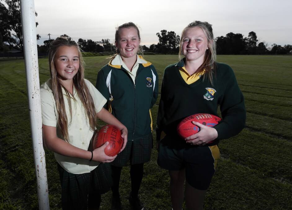 Billabong High School students Olivia Hall, 14, Alyce Parker, 13, and April Lieschke, 15, will play for NSW. Picture: MATTHEW SMITHWICK