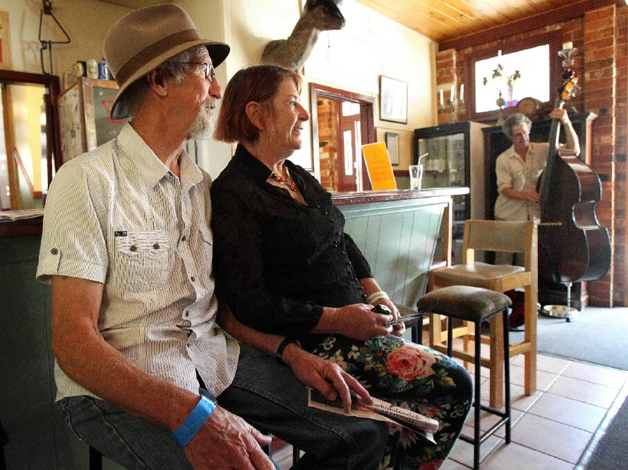 Folk music lovers Graeme Cripps and Noeline Hartwig listen in at the town’s Star Hotel.