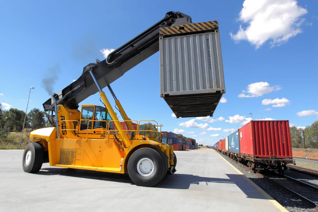 Terminal operator Bryden Power drives a stacker to move containers around. Picture: DAVID THORPE