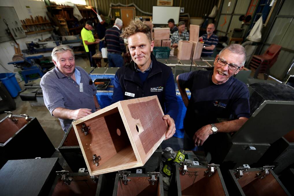 The blokes at the Thurgoona Men’s Shed have been making nesting boxes for squirrel gliders. David Cunningham from the men’s shed is with Sam Niedra and Jim Templeton from the Great Eastern Ranges Initiative. Picture: JOHN RUSSELL