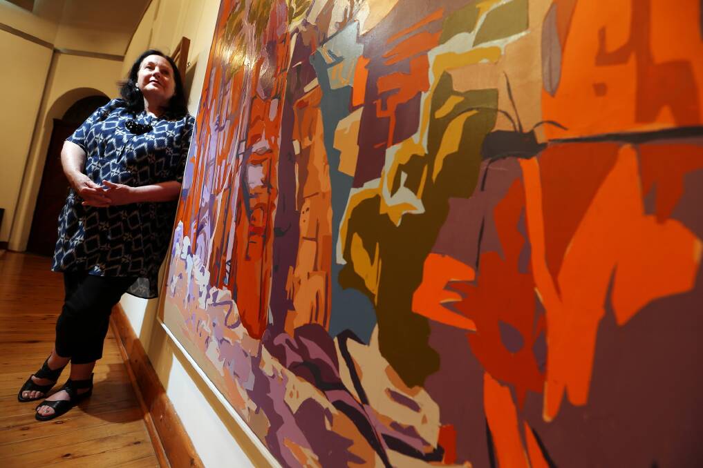 Dianne Mangan with one of the works from Namatjira and Beyond, which is on show at the Wangaratta Art Gallery from today until February. Picture: JOHN RUSSELL