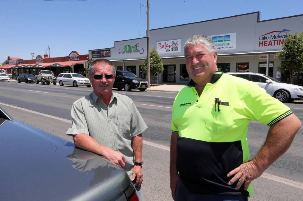 Businessman Bob Kay and Mulwala Progress Association president Rob Purtle are keen to see the Melbourne Street improvements go ahead as previously planned. The project is under review. Picture: PETER MERKESTEYN