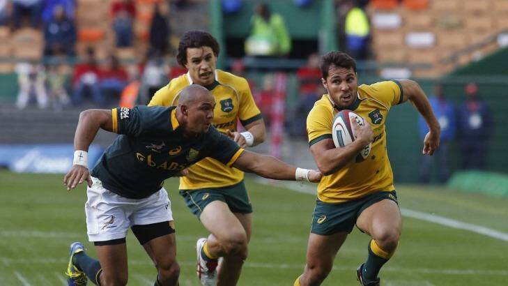 No regrets: Nick Phipps tries to evade Cornal Hendricks in Cape Town on Saturday. Photo: AP Photo