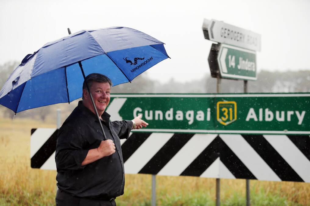 Brett Drinnan with one of the last signs in the region showing the way for the old Hume Highway 31. Picture: JOHN RUSSELL
