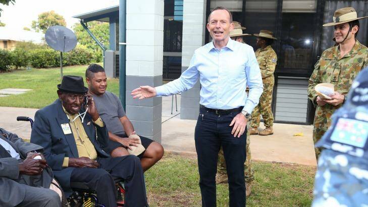 Tony Abbott and Palm Stephen during a medal presentation for veterans on Thursday Island. Photo: Alex Ellinghausen