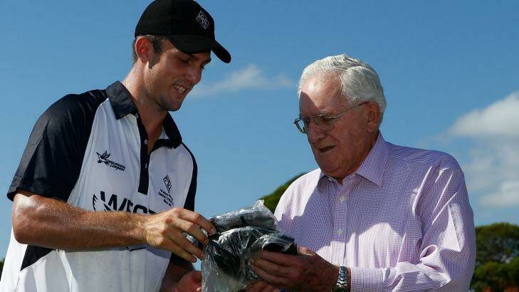 If the cap fits: Alan Davidson presents Mitchell Marsh with his Wests cap. Photo: Daniel Munoz