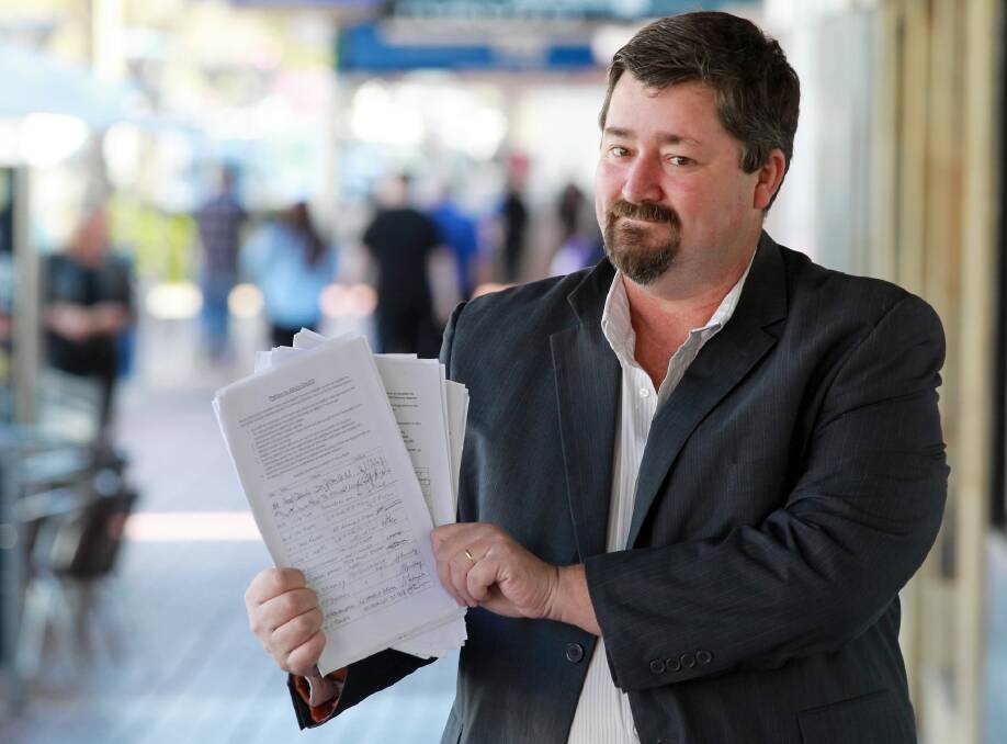 Darren Cameron with the hard-rubbish petition he will present on Monday. Picture: KYLIE ESLER