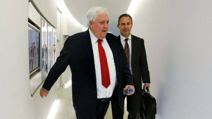 Palmer United Party leader Clive Palmer (left) with his PR man Andrew Crook (right) .
