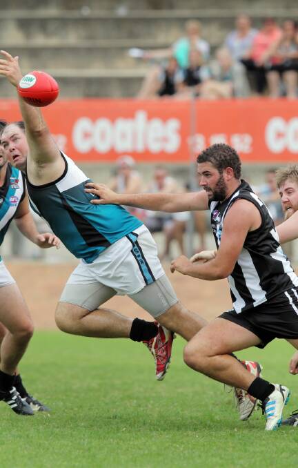 Murray Magpies coach Corey Lambert says defender Josh Senior, right, has gone to another level.