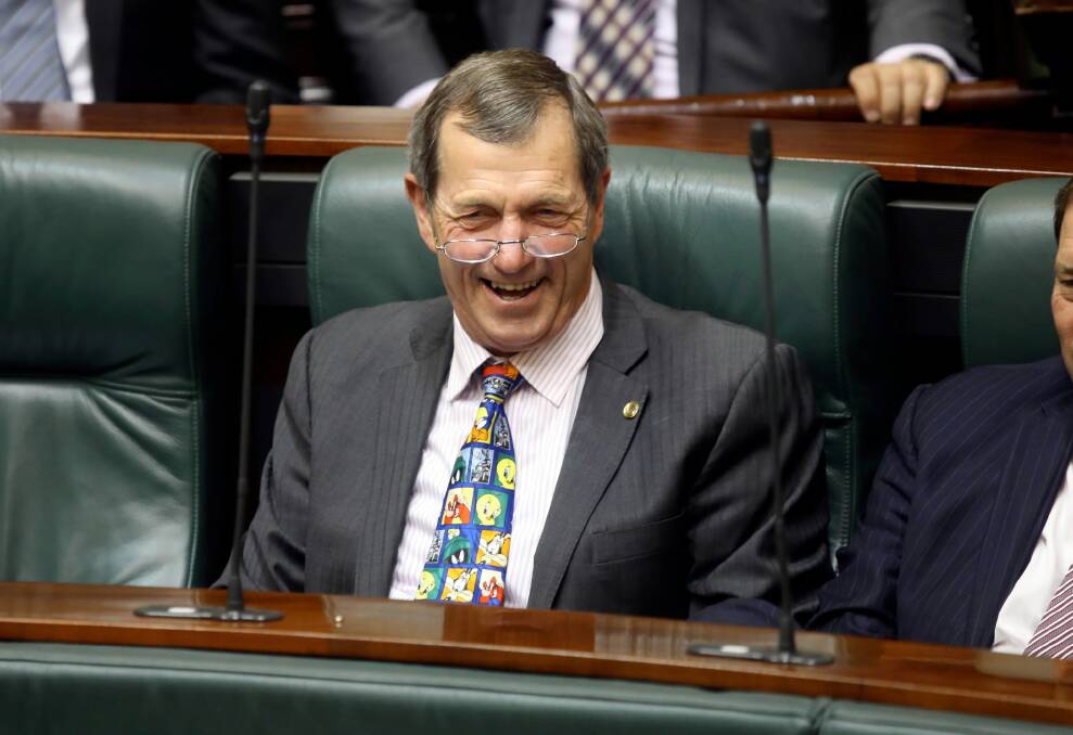 Bill Sykes enjoys a laugh during his last day in Parliament yesterday. Picture: FAIRFAX