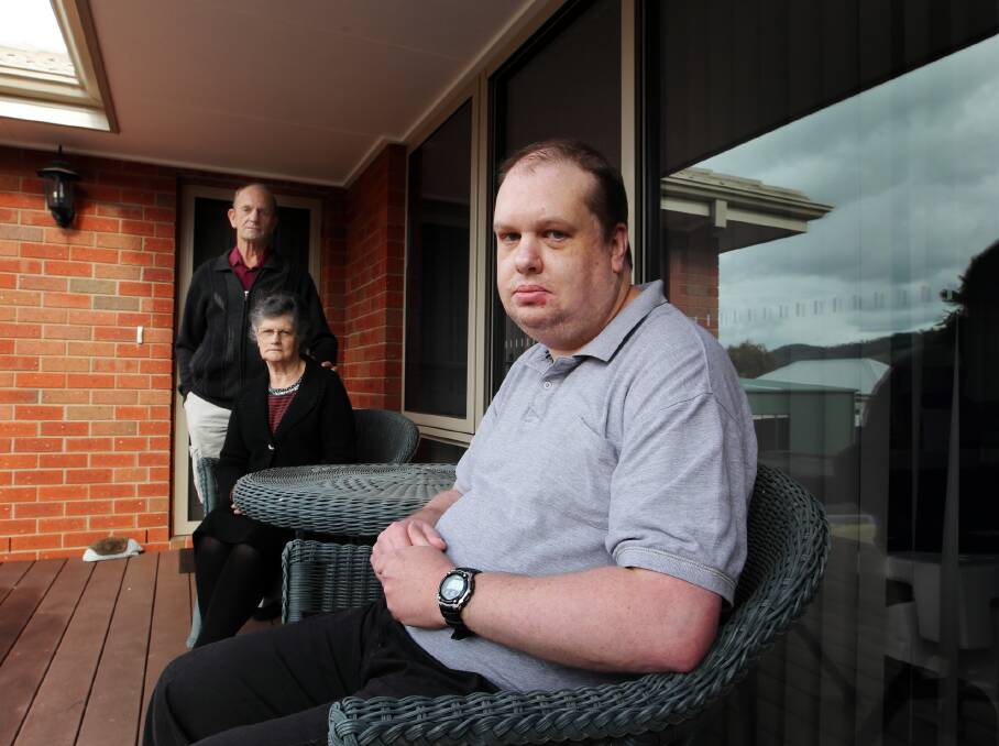 Ron and Merrilyne Humphrey with their son, Michael. Wodonga Council has lifted their rates because of the increased home valuation after they built an extension onto their house for Michael. Picture: DAVID THORPE