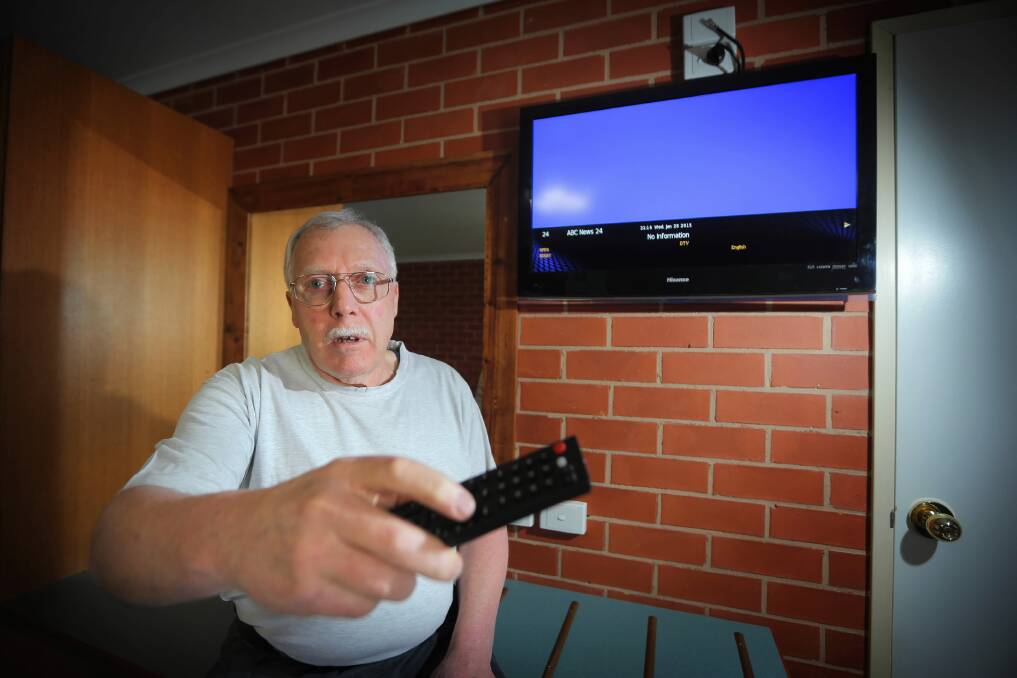 Russell Gronow is concerned that he cannot access the ABC or Prime 7 on the television sets in his motel, and is asking fellow residents to report their issues as well. Picture: TARA GOONAN