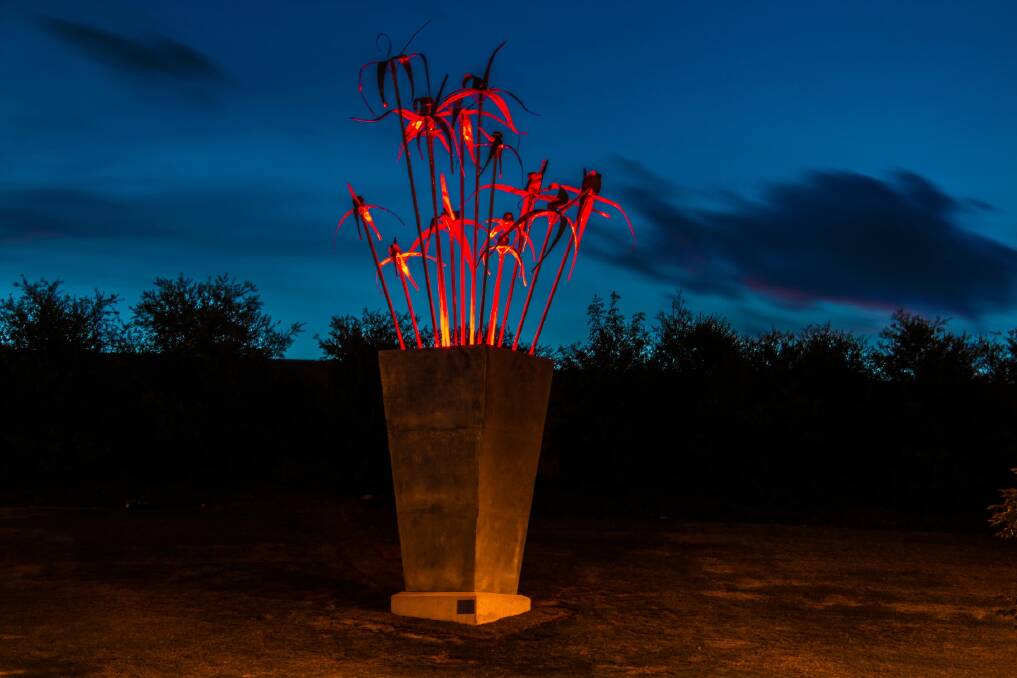 The new sculpture Grow, at night. Picture: MATTHEW GARDINER